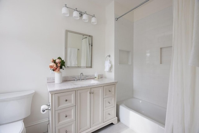 bathroom with shower / bath combo with shower curtain, toilet, and vanity