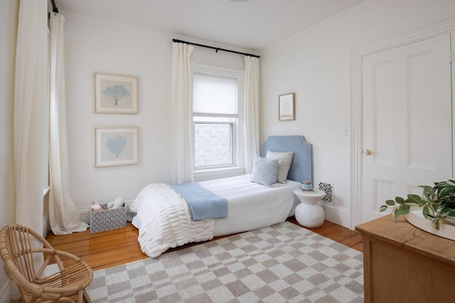 bedroom with light wood-style flooring