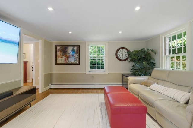 217 Conant Rd, Weston, MA 02493 - living room with a baseboard heating unit, light wood finished floors, recessed lighting, and ornamental molding
