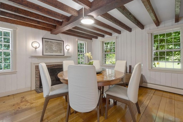 217 Conant Rd, Weston, MA 02493 - dining space featuring light wood finished floors, beam ceiling, ceiling fan, and a baseboard heating unit