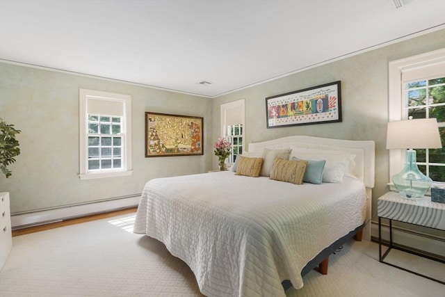 217 Conant Rd, Weston, MA 02493 - bedroom with a baseboard heating unit and ornamental molding