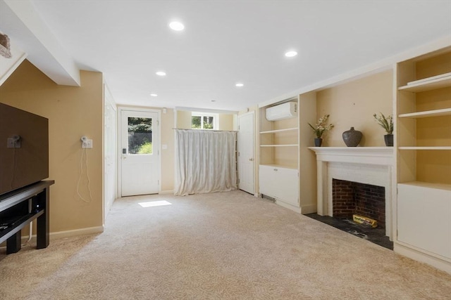 217 Conant Rd, Weston, MA 02493 - unfurnished living room with a fireplace with flush hearth, light carpet, recessed lighting, and a wall mounted air conditioner