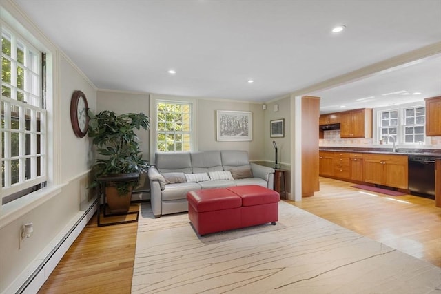217 Conant Rd, Weston, MA 02493 - living room featuring baseboard heating, light wood-style flooring, ornamental molding, recessed lighting, and a baseboard heating unit