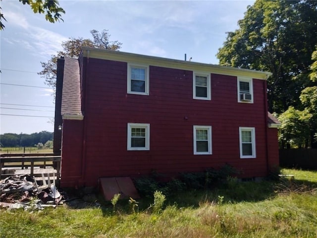62 Chestnut St, Seekonk, MA 02771 - view of side of property with fence and a chimney