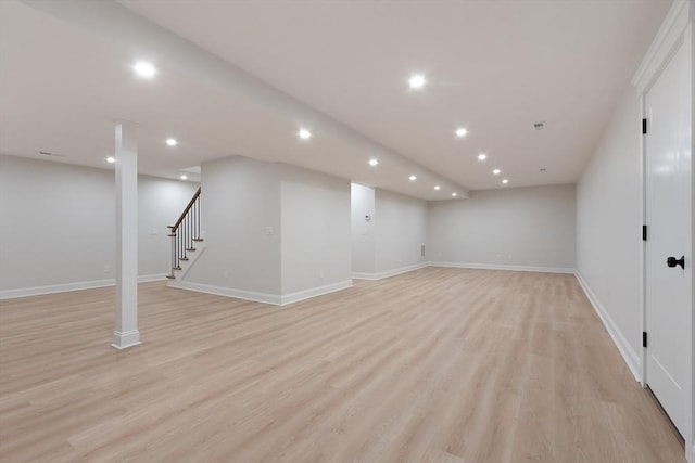 basement featuring light wood-type flooring