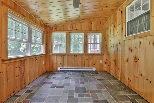 589 Turnpike, Ashby, MA 01431 - unfurnished sunroom featuring a baseboard heating unit, healthy amount of natural light, and vaulted ceiling