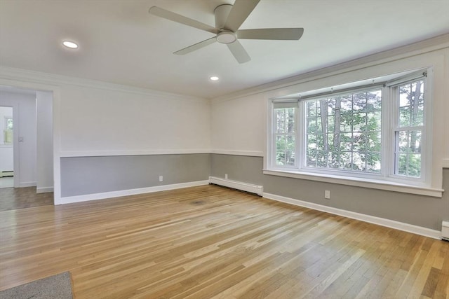 589 Turnpike, Ashby, MA 01431 - unfurnished room with baseboard heating, light wood finished floors, ceiling fan, crown molding, and recessed lighting