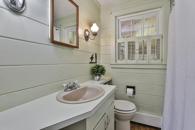 589 Turnpike, Ashby, MA 01431 - full bath featuring a baseboard radiator, vanity, a shower with shower curtain, and crown molding