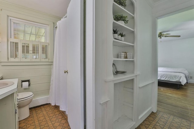 589 Turnpike, Ashby, MA 01431 - full bath featuring vanity, baseboard heating, crown molding, a ceiling fan, and a shower with curtain