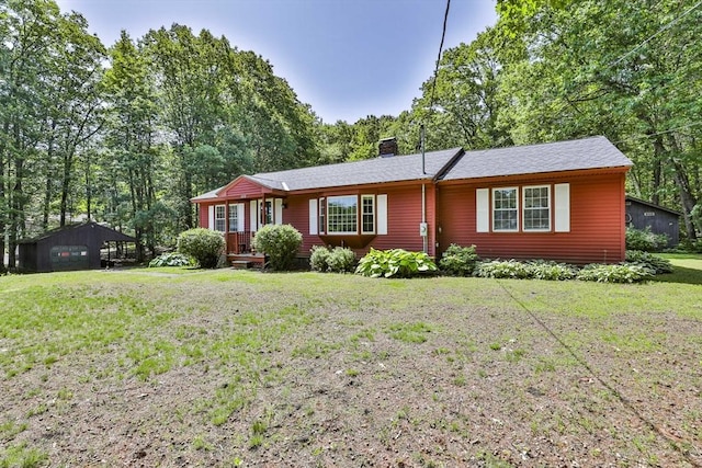 589 Turnpike, Ashby, MA 01431 - ranch-style house with a chimney and a front lawn