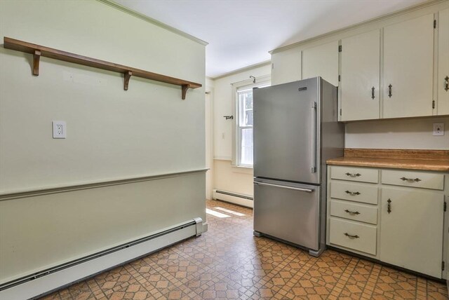 589 Turnpike, Ashby, MA 01431 - kitchen with baseboard heating, freestanding refrigerator, and open shelves