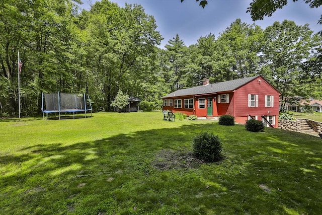 589 Turnpike, Ashby, MA 01431 - view of green lawn with a trampoline