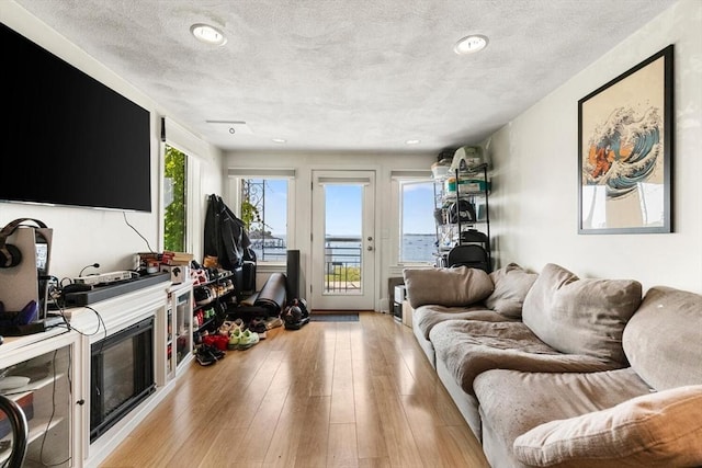 374 Humphrey St Unit 4, Swampscott, MA 01907 - living area featuring light wood-type flooring and recessed lighting