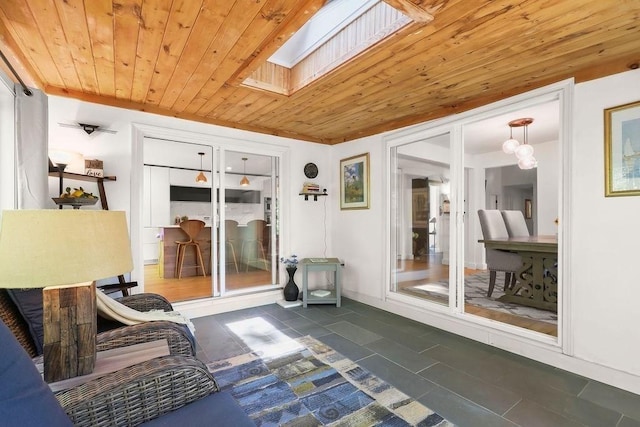 sunroom / solarium with a skylight