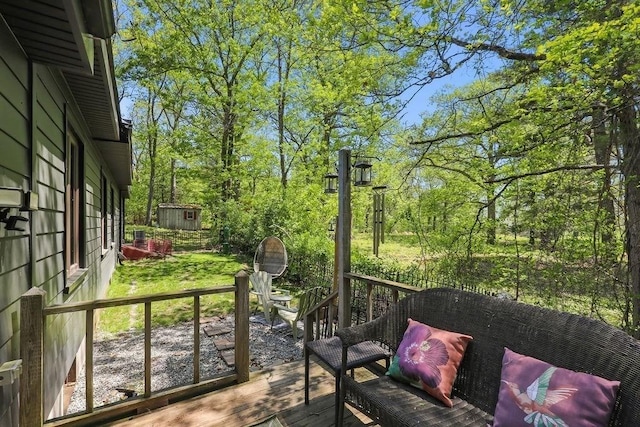 view of wooden balcony with a deck