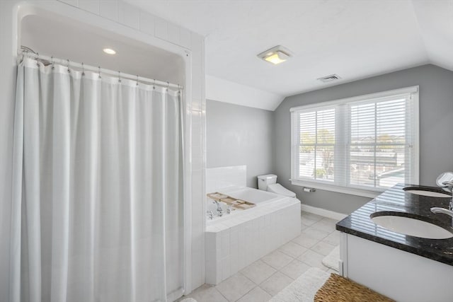 full bathroom with visible vents, a sink, and vaulted ceiling