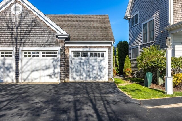 garage with driveway