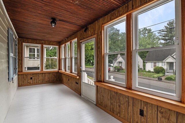 33 Intervale Ave, Saugus, MA 01906 - unfurnished sunroom with wood walls, plenty of natural light, wood finished floors, and wooden ceiling