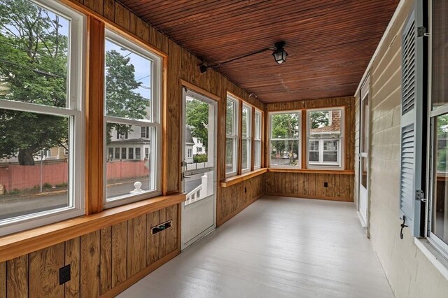 33 Intervale Ave, Saugus, MA 01906 - unfurnished sunroom featuring wood walls, wooden ceiling, and wood finished floors