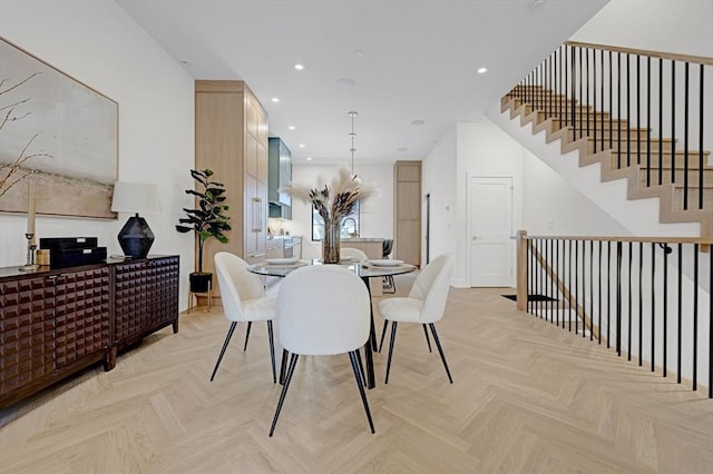 dining area with recessed lighting and stairs