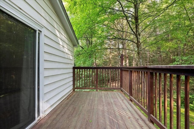 39 Mashapaug Rd, Sturbridge, MA 01566 - wooden deck featuring a wooded view