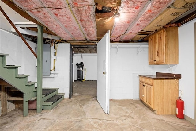 39 Mashapaug Rd, Sturbridge, MA 01566 - unfinished basement with electric panel and stairway