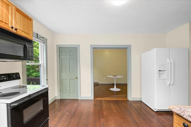 39 Mashapaug Rd, Sturbridge, MA 01566 - kitchen with electric range oven, black microwave, white refrigerator with ice dispenser, dark wood-style floors, and light stone countertops