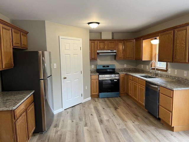 48 N Main St, New Salem, MA 01355 - kitchen featuring stainless steel appliances, a sink, under cabinet range hood, light wood-style floors, and brown cabinetry