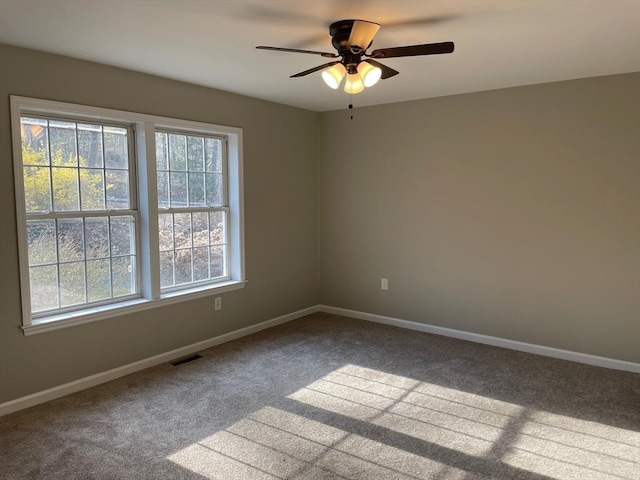 48 N Main St, New Salem, MA 01355 - carpeted spare room featuring baseboards and a ceiling fan