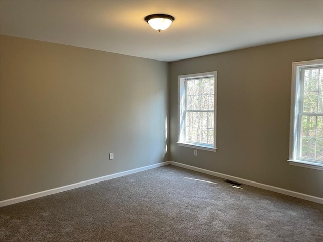 48 N Main St, New Salem, MA 01355 - spare room with baseboards and dark carpet