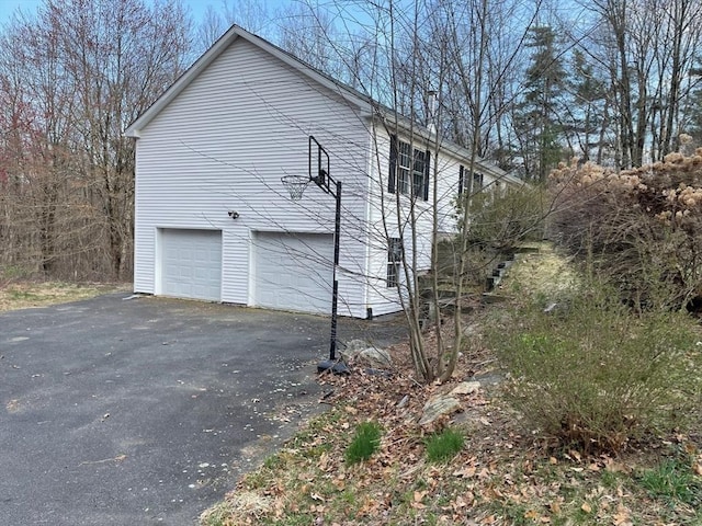 48 N Main St, New Salem, MA 01355 - view of home's exterior with asphalt driveway and an attached garage