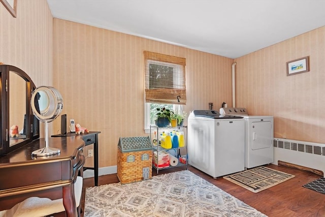 48 Gorham Ave, Stoneham, MA 02180 - washroom with wallpapered walls, independent washer and dryer, wood finished floors, and radiator heating unit