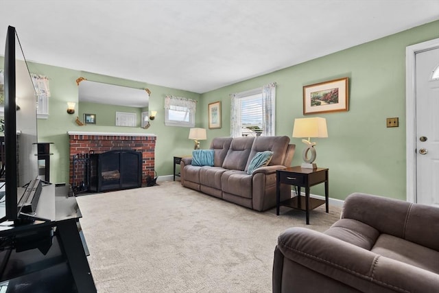 48 Gorham Ave, Stoneham, MA 02180 - living room with baseboards, a fireplace, and carpet