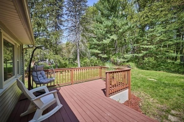 wooden terrace with a yard
