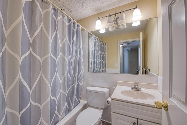 full bath featuring vanity, a textured ceiling, tile walls, toilet, and shower / tub combo with curtain