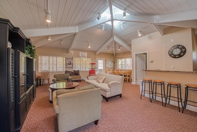 carpeted living room featuring lofted ceiling with beams, wood ceiling, and track lighting