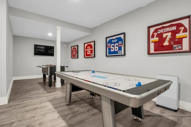 playroom with baseboards, recessed lighting, and wood finished floors