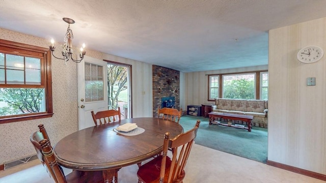 10 Briarwood Rd, Woburn, MA 01801 - dining room featuring wallpapered walls, a chandelier, and light colored carpet
