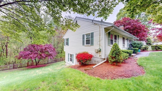 10 Briarwood Rd, Woburn, MA 01801 - view of home's exterior with a chimney