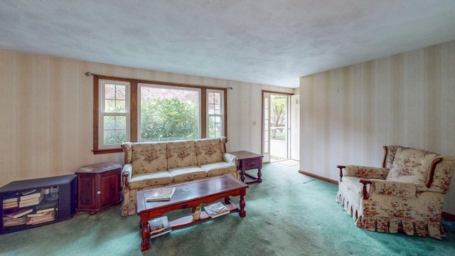 10 Briarwood Rd, Woburn, MA 01801 - living area with carpet floors, wallpapered walls, and a textured ceiling