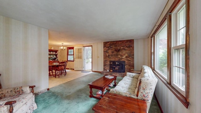 10 Briarwood Rd, Woburn, MA 01801 - living area with carpet, healthy amount of natural light, a chandelier, and baseboards
