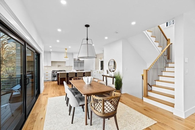 38 Old Shipyard Ln, Hanover, MA 02339 - dining room featuring recessed lighting, light wood-type flooring, and stairway