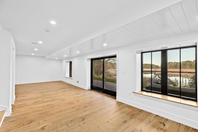 38 Old Shipyard Ln, Hanover, MA 02339 - unfurnished living room with light wood finished floors, recessed lighting, and baseboards