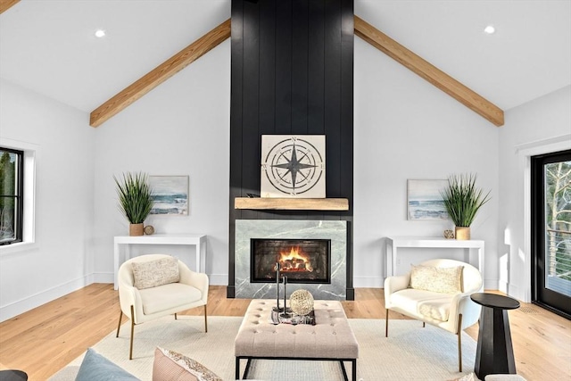 38 Old Shipyard Ln, Hanover, MA 02339 - living room with beam ceiling, high vaulted ceiling, a high end fireplace, wood finished floors, and recessed lighting