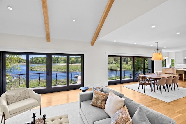 38 Old Shipyard Ln, Hanover, MA 02339 - living room featuring beam ceiling, recessed lighting, light wood-style floors, plenty of natural light, and a water view