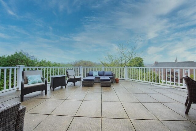 35 Commonwealth Ave Unit 404, Newton, MA 02467 - view of patio featuring an outdoor hangout area