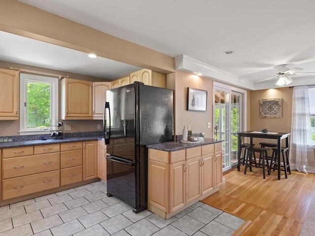 34 Kinsley Rd, Acton, MA 01720 - kitchen with freestanding refrigerator, light brown cabinets, and dark countertops