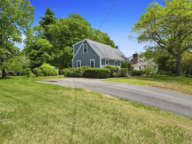 34 Kinsley Rd, Acton, MA 01720 - view of side of property with a lawn