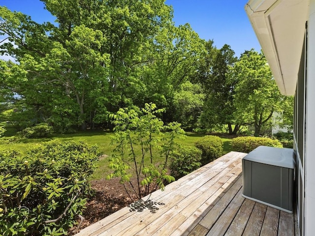 34 Kinsley Rd, Acton, MA 01720 - wooden deck featuring view of wooded area