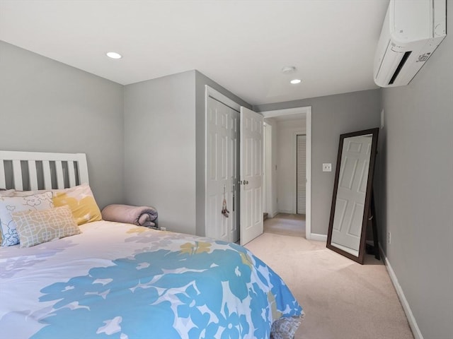 34 Kinsley Rd, Acton, MA 01720 - bedroom featuring a wall unit AC, light colored carpet, baseboards, recessed lighting, and a closet